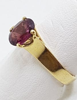 9ct Yellow Gold Oval Claw Set Garnet Ring