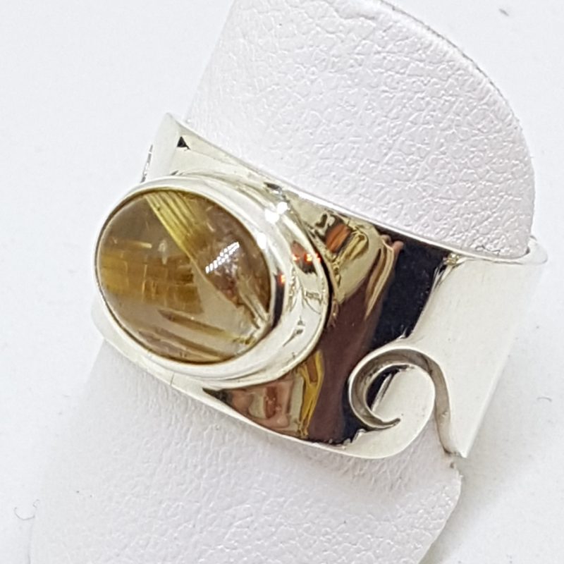 Sterling Silver Oval Rutilated Quartz in Wide Band Ring with Wave Design
