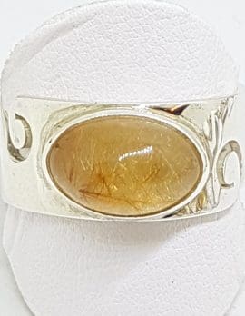 Sterling Silver Oval Rutilated Quartz in Wide Band Ring with Wave Design