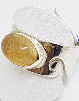 Sterling Silver Oval Rutilated Quartz in Wide Band Ring with Wave Design
