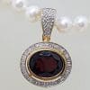 9ct Gold Oval Garnet surrounded by Diamonds Enhancer Pendant on Pearl Necklace