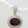 9ct Gold Oval Garnet surrounded by Diamonds Enhancer Pendant on Pearl Necklace