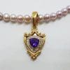 9ct Gold Shield Shape Amethyst surrounded by Diamonds Enhancer Pendant on Pearl Necklace