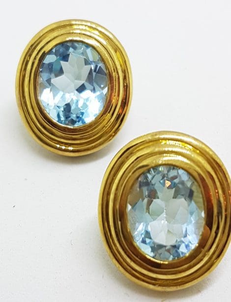 9ct Yellow Gold Large Oval Blue Topaz Stud Earrings