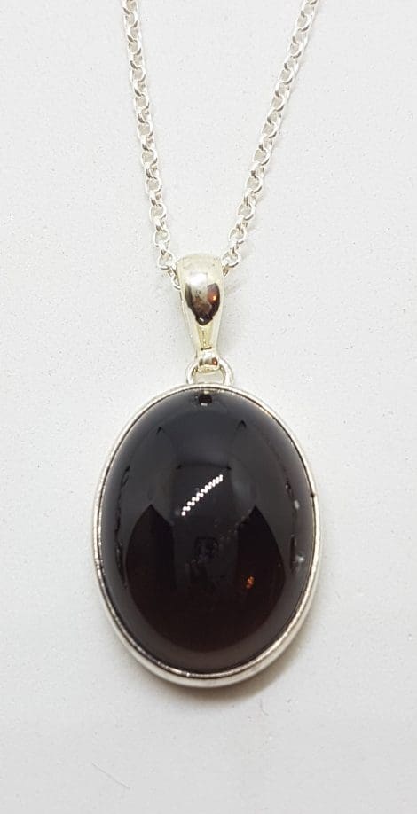 Sterling Silver Oval Cabochon Garnet Pendant on Silver Chain
