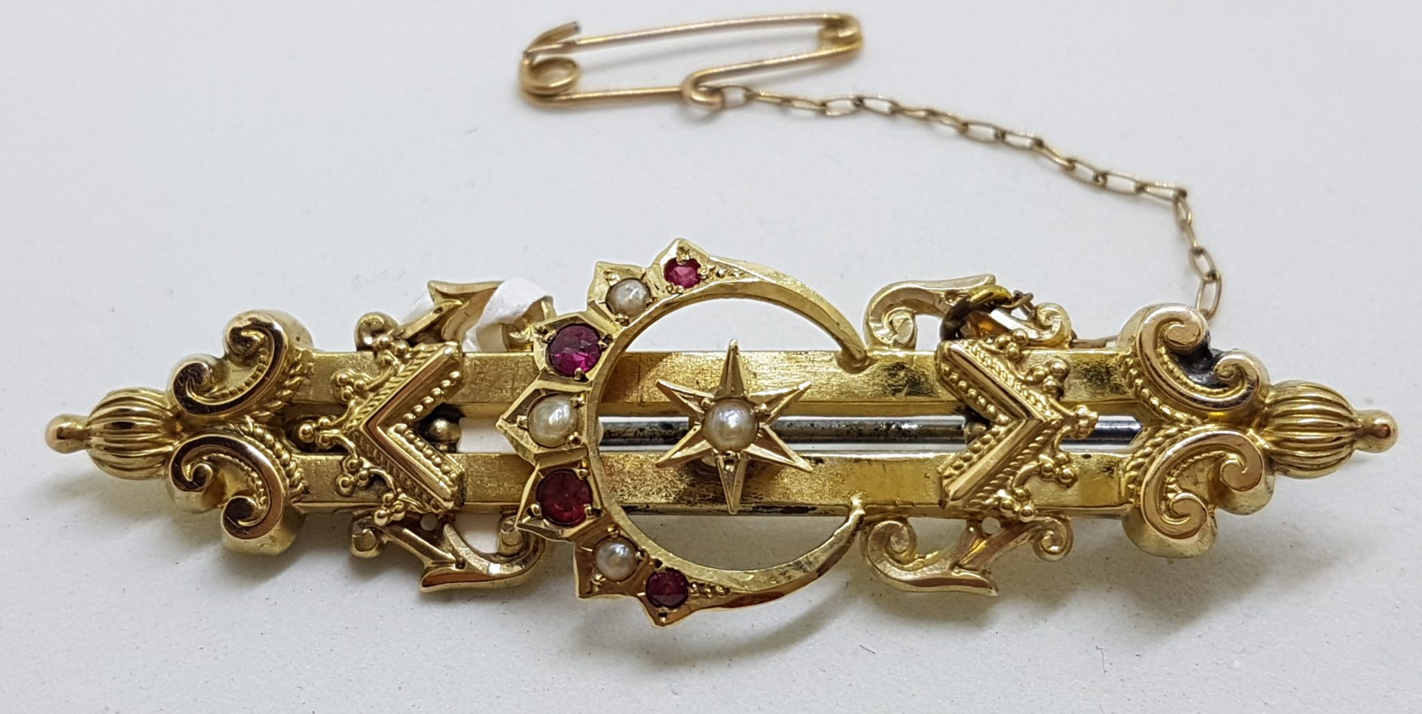 20200630_192752 15ct Yellow Gold Ruby and Seedpearl Ornate Crescent and Star Bar Brooch