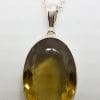 Sterling Silver Oval Citrine Pendant on Silver Chain