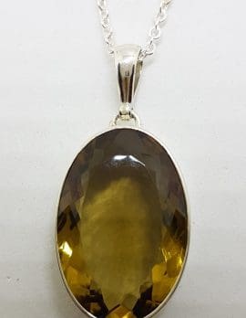 Sterling Silver Oval Citrine Pendant on Silver Chain