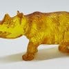 Hand Carved Natural Baltic Amber Small Rhinoceros Figurine / Statue
