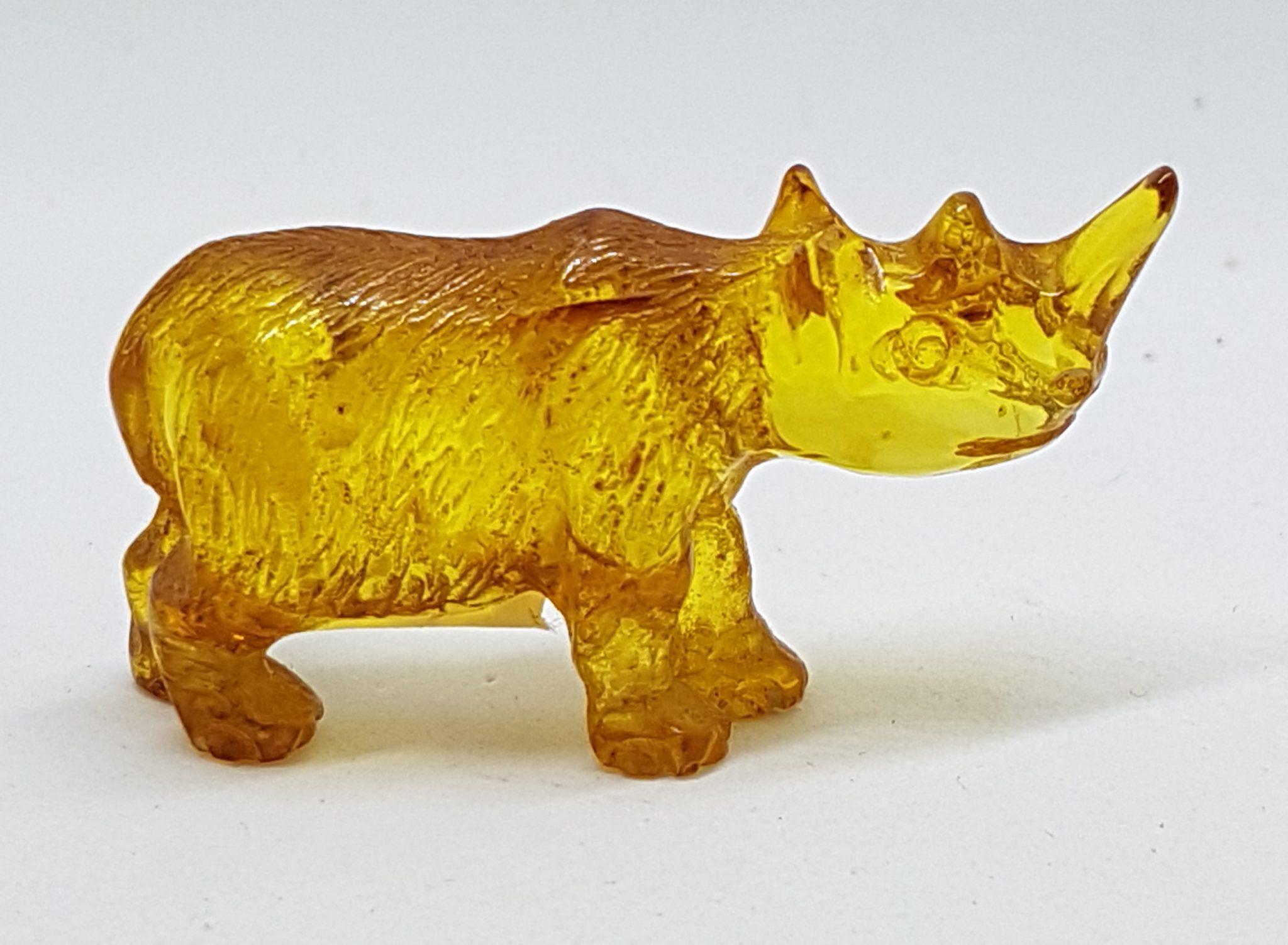 20200730_140903 Hand Carved Natural Baltic Amber Small Rhinoceros Figurine / Statue