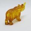 Hand Carved Natural Baltic Amber Small Rhinoceros Figurine / Statue