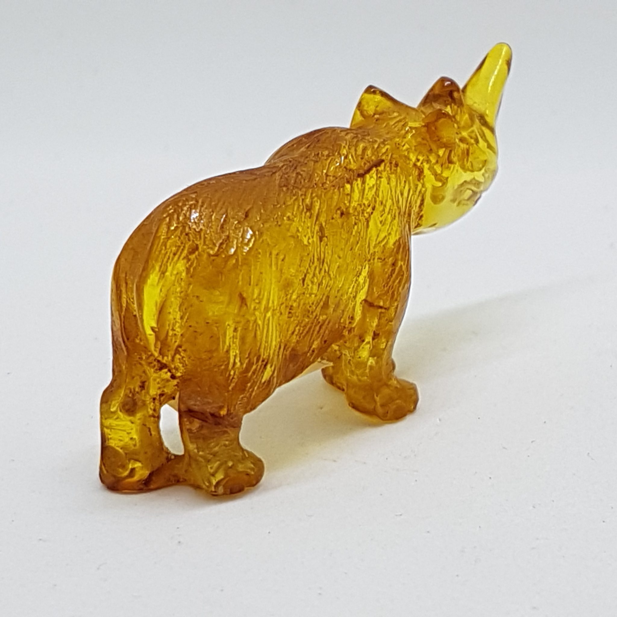 20200730_140949 Hand Carved Natural Baltic Amber Small Rhinoceros Figurine / Statue