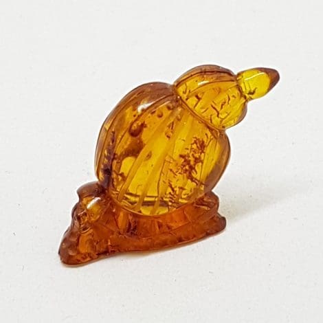 Hand Carved Natural Baltic Amber Small Snail Figurine / Statue