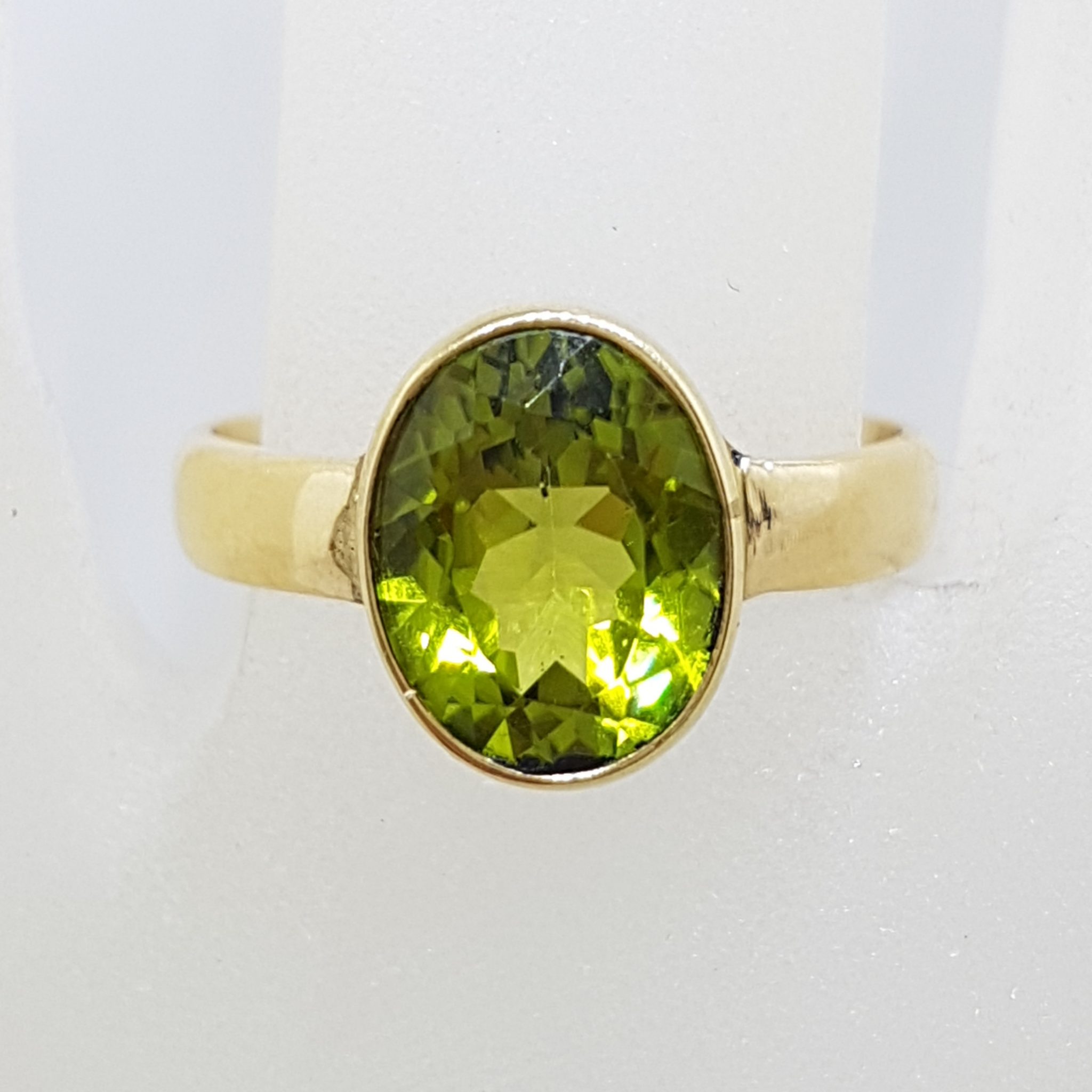 9ct Yellow Gold Peridot Oval Bezel Set Ring