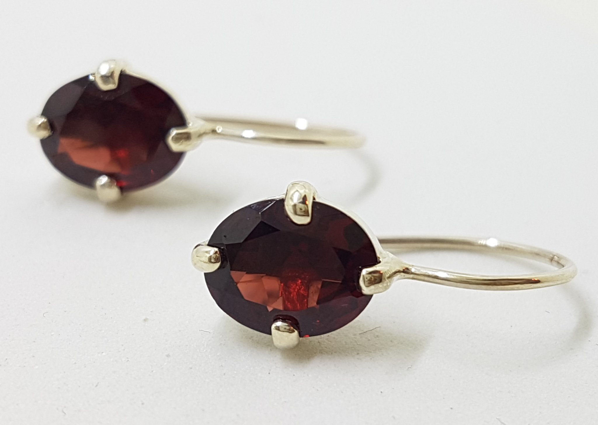 Sterling Silver Oval Claw Set Garnet Drop Earrings