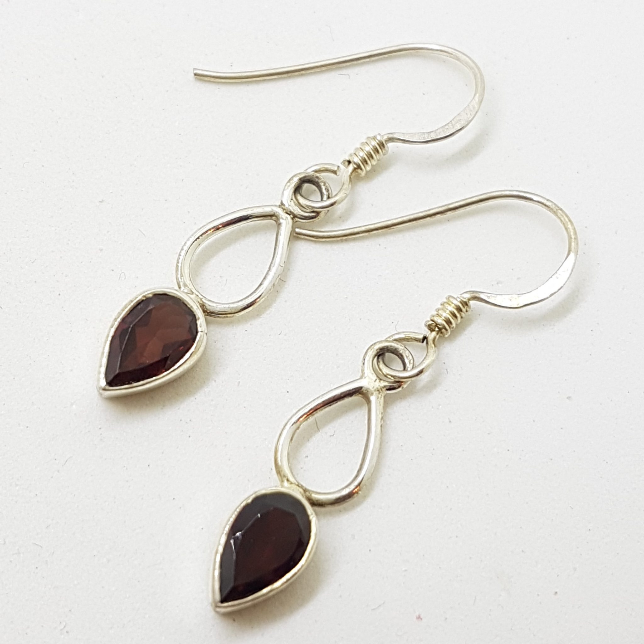 Sterling Silver Teardrop / Pair Shape Garnet Twist Drop Earrings