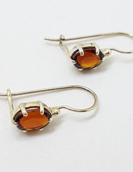Sterling Silver Oval Claw Set Garnet Drop Earrings