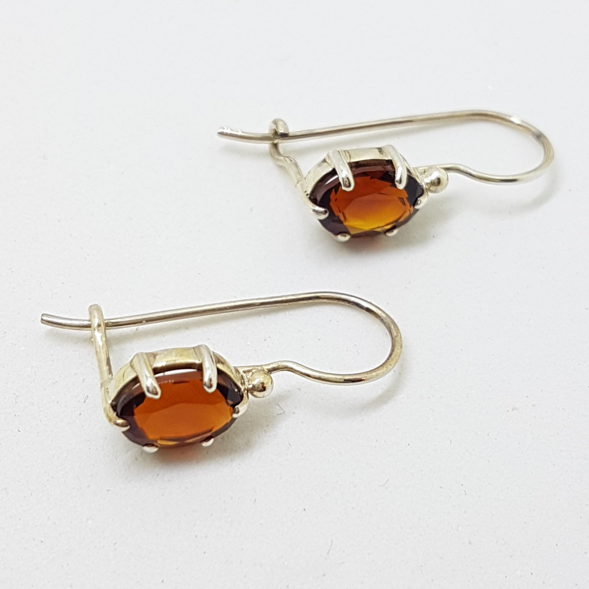 Sterling Silver Oval Claw Set Garnet Drop Earrings