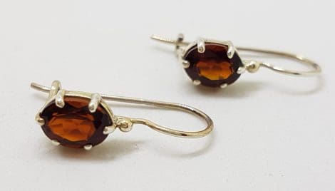 Sterling Silver Oval Claw Set Garnet Drop Earrings