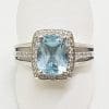9ct White Gold Blue Topaz Surrounded by Diamonds Rectangular Cluster Ring