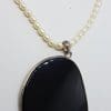 Sterling Silver Large Onyx Pendant on Pearl NecklaceSterling Silver Large Onyx Pendant on Pearl Necklace