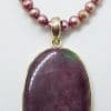 Sterling Silver Large Oval Ruby Zoisite Pendant on Pink Pearl Necklace