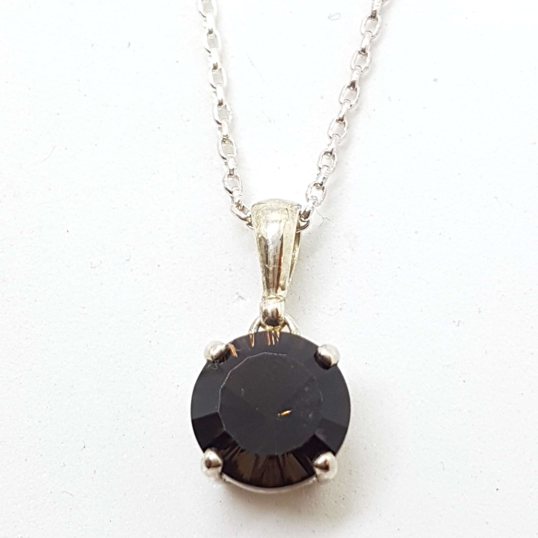 Sterling Silver Round Laser Cut Smokey Quartz Pendant on Silver Chain