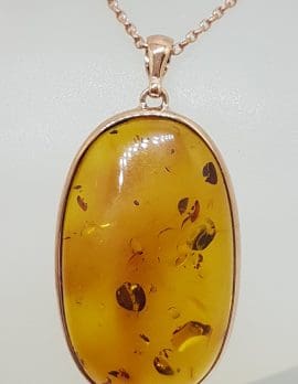 9ct Rose Gold Large Oval Amber Pendant on 9ct Chain