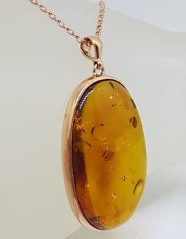 9ct Rose Gold Large Oval Amber Pendant on 9ct Chain