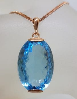 9ct Rose Gold Large Oval Blue Topaz Pendant on 9ct Chain