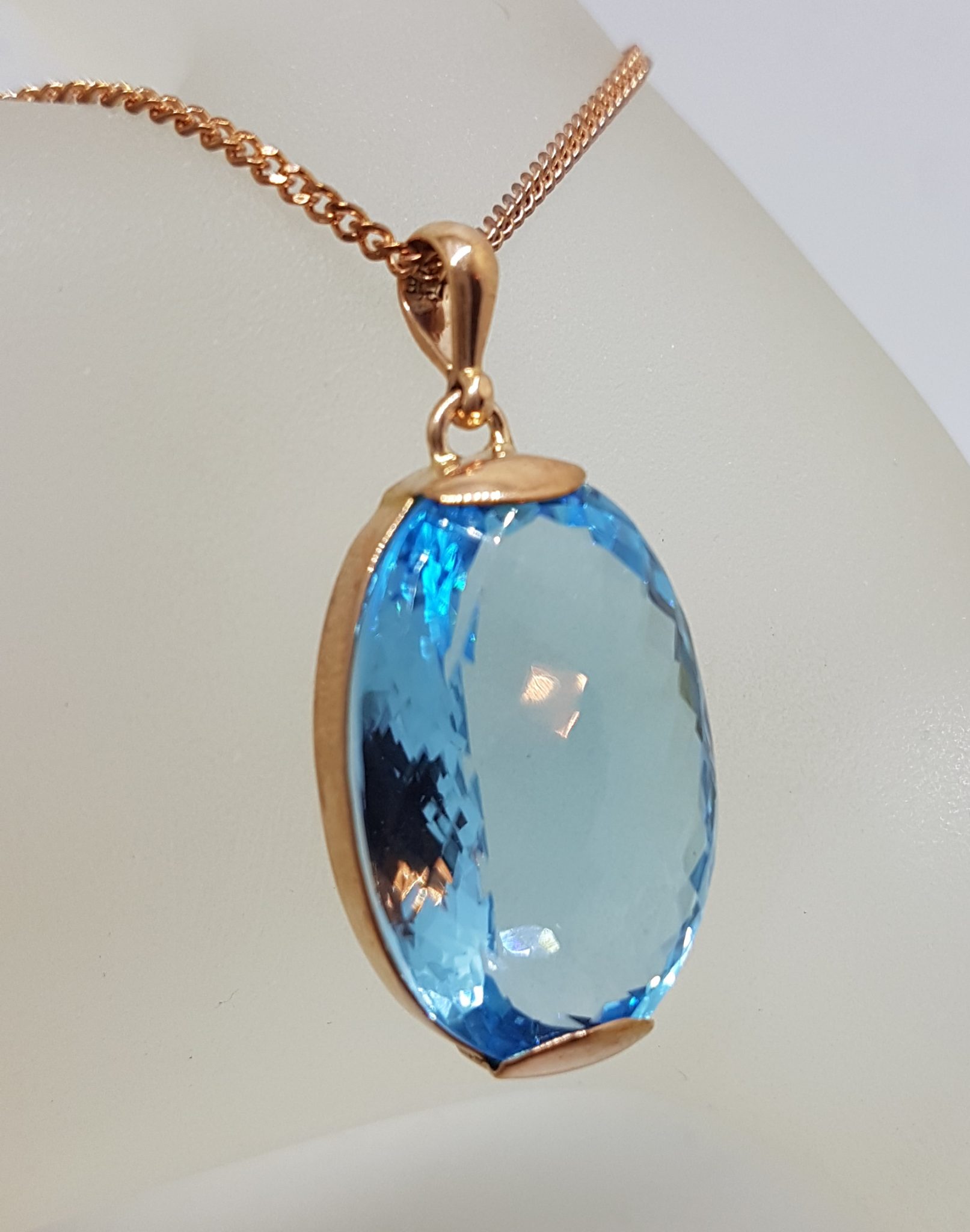 9ct Rose Gold Large Oval Blue Topaz Pendant on 9ct Chain
