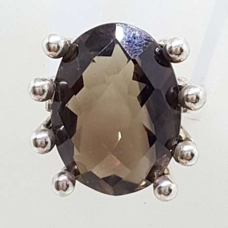 Sterling Silver Large Oval Claw Set Smokey Quartz Ring
