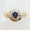 9ct Yellow Gold Oval Natural Blue Sapphire Surrounded by Claw and Channel Set Diamonds Engagement and Wedding Ring Set