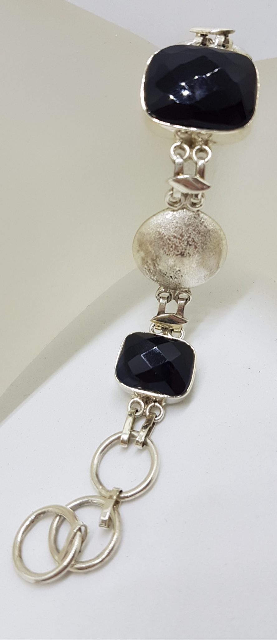Sterling Silver Faceted Onyx with Matt Finish Circles Bracelet