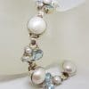 Sterling Silver Mabe Pearl and Round Pearl with Topaz Cluster Bracelet