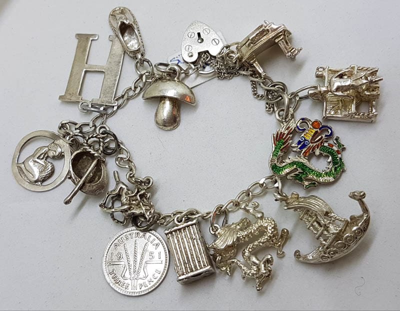 20201006_204739 Sterling Silver Heavy Vintage Charm Bracelet with Assorted Charms