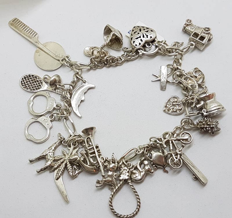 Sterling Silver Heavy Vintage Charm Bracelet with Assorted Charms