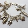 Sterling Silver Heavy Vintage Charm Bracelet with Assorted Charms Including Jointed Teddy Bear