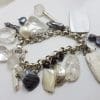 Sterling Silver Vintage Large and Heavy Charm Bracelet with Pearls and Mother of Pearl