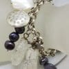 Sterling Silver Vintage Large and Heavy Charm Bracelet with Pearls and Mother of Pearl