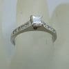 18ct White Gold Princess Square Cut Diamond Claw and Channel Set Engagement Ring