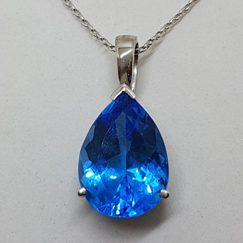 20201027_150017 9ct White Gold Large Teardrop Shape Blue Topaz Enhancer Pendant on Gold Chain