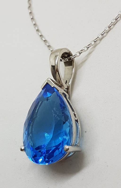 20201027_150032 9ct White Gold Large Teardrop Shape Blue Topaz Enhancer Pendant on Gold Chain