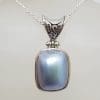 Sterling Silver Rectangular Blue / Grey Mabe Pearl Ornate Top Pendant on Silver Chain
