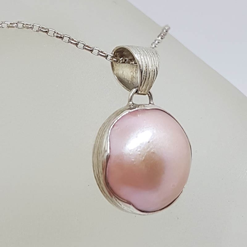 Sterling Silver Round Pink Mabe Pearl Wave Design on Sides Pendant on Silver Chain