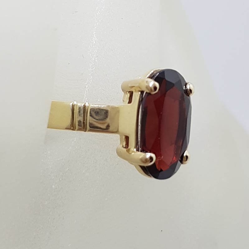 9ct Yellow Gold Oval Claw Set Elongated Garnet Ring