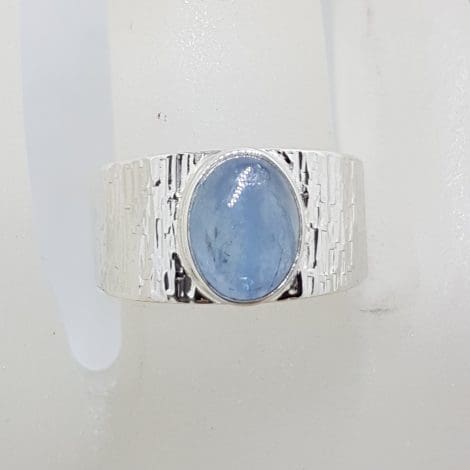 Sterling Silver Oval Bezel Set on Wide Patterned Design Band Cabochon Cut Aquamarine Ring