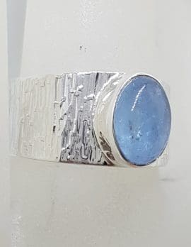 Sterling Silver Oval Bezel Set on Wide Patterned Design Band Cabochon Cut Aquamarine Ring