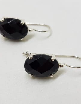 Sterling Silver Oval Faceted Onyx Claw Set Drop Earrings
