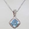 9ct White Gold Square Topaz Surrounded by Diamond Cluster Pendant on Gold Chain
